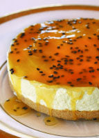 White Chocolate Cheesecake With Passion Orange Sauce